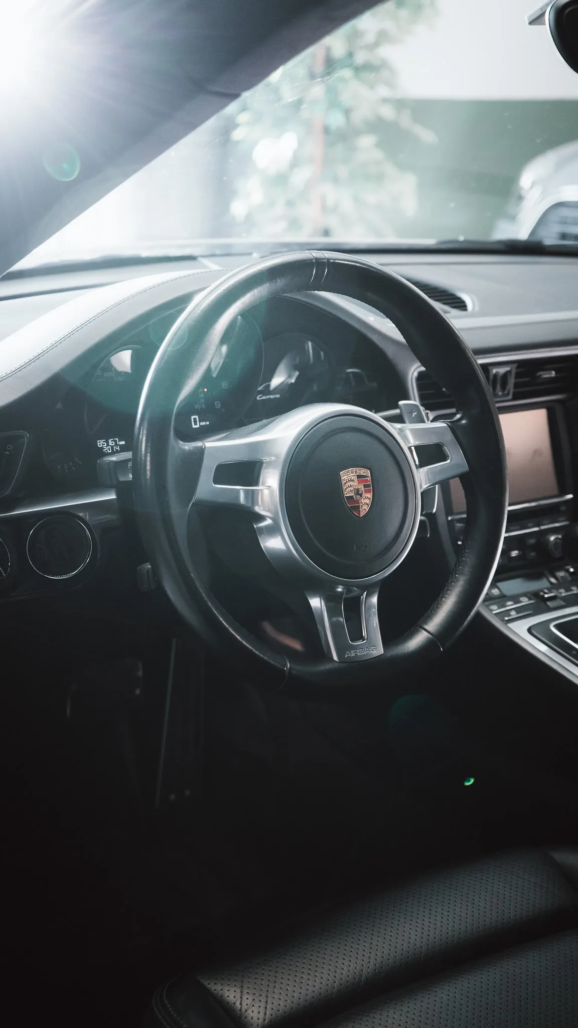 Volant Porsche 911 Carrera, gros plan intérieur